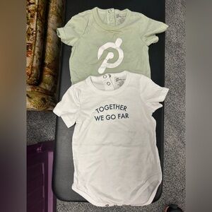 Peloton infant bodysuits